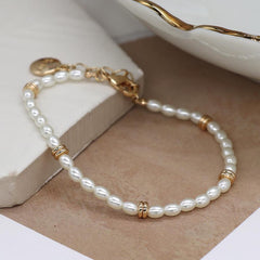 SEED PEARL BRACELET WITH FAUX GOLD RING SPACERS