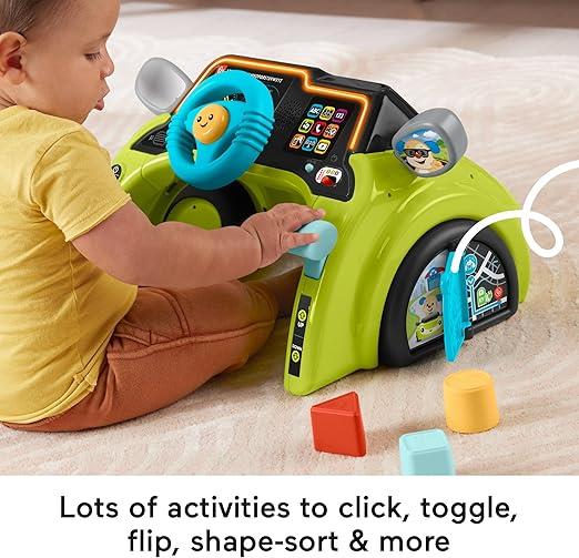 FISHER PRICE LAUGH AND LEARN SIT AND STEER DRIVER